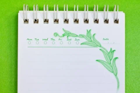 Close up of a note paper on green background with clipping path Foto stock