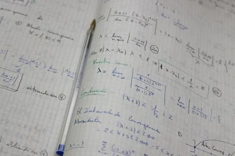 Close-up of a notebook with mathematical limits exercises Stock Photos