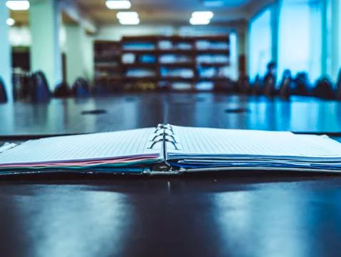 Close up notebook on the meeting table in office Stock Photos