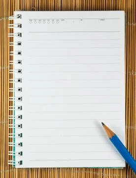Close up of notebook with pencil Stock Photos