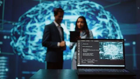Close up of notebook used by employees developing AI systems in tech startup Foto stock