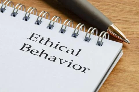 Close up notepad with the words Ethical Behaviour written on a page placed .. Stock Photos