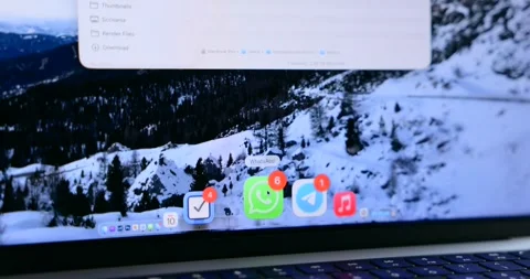 Close up of notification badges on MacBook laptop screen Stock Footage 336657831