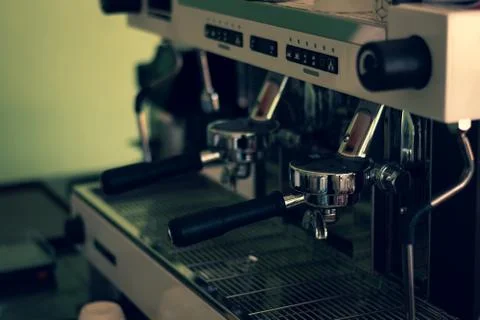 Close up nozzle of modern and automatic of coffee making machine. Stock Photos