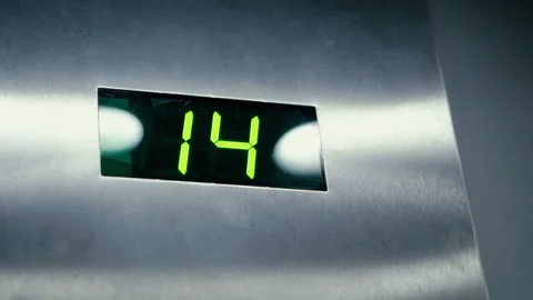 Close up number floor on screen during elevator stays Video stock 214543442