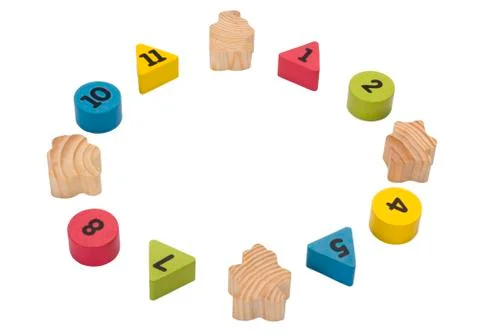 Close-up of numeric blocks with hidden numbers arranged in circular shape 스톡 사진