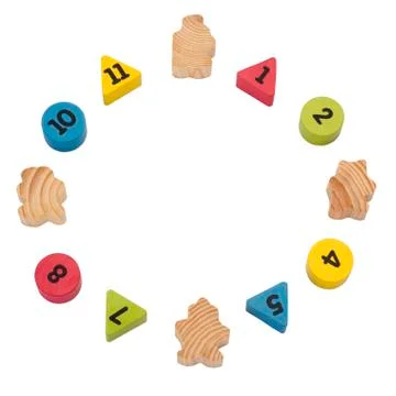 Close-up of numeric blocks with hidden numbers arranged in circular shape 写真素材