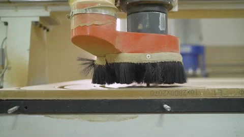 Close-up of a numerical control machine cuts a tree. Stockbeeldmateriaal 146924189