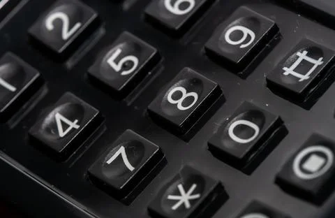 Close up of numerical dial buttons on an old analog phone. Stock Photos
