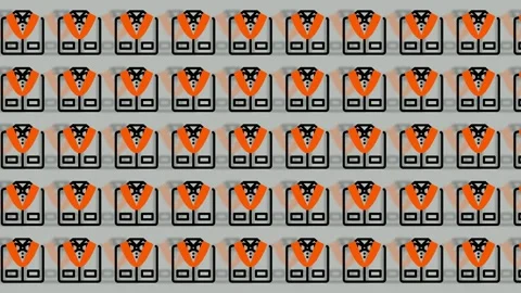Close-up of numerous orange and black security tags arranged in neat rows o.. Stock Footage 325388700