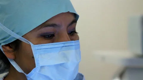 CLOSE UP. Nurse face during surgery. Stock Footage 51169413