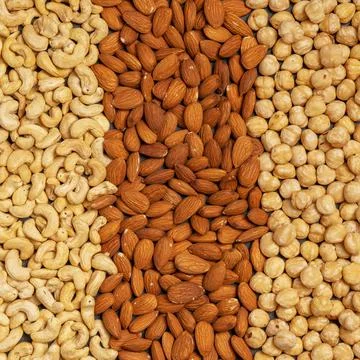 Close-up of nuts background: cashews, hazelnuts, almonds. Healthly food. A Stock-Fotos