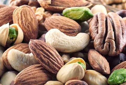 Close up of nuts on white Stock Photos