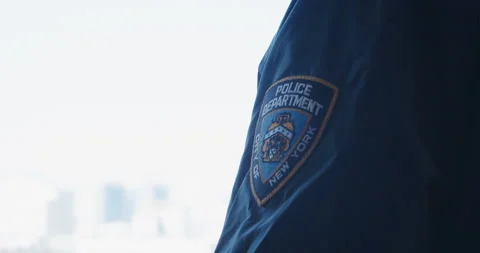 Close Up of NYPD Shirt Patch and back Stock Footage