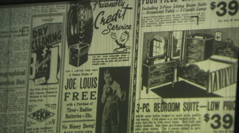 Close up o f microfiche viewing screen as newspaper spins through Video stock 49363525