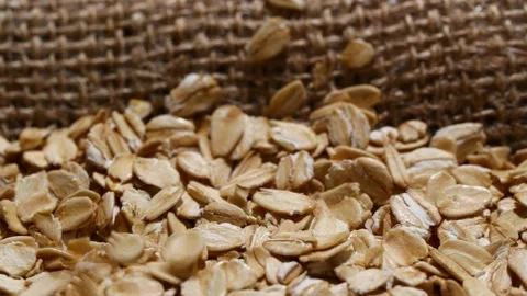 Close-up oatmeal texture, closeup oat flakes, vegetarian healthy food background Stock Footage 200087864
