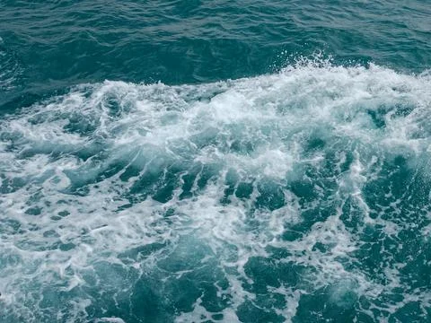 A close-up of the ocean wave surface wallpaper in the sunlight Stock Photos