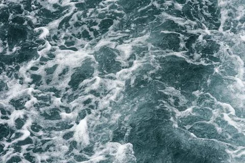 A close-up of the ocean wave surface wallpaper in the sunlight Stock Photos