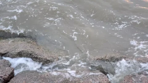 Close up of ocean waves crashing on rocks Stock Footage 253717953