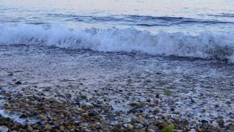 Close Up Ocean Waves on Pebble Beach 4K Static 스톡 동영상 331971359