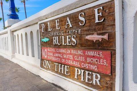 Close-Up of Oceanside Pier Rules Sign with No Diving 写真素材