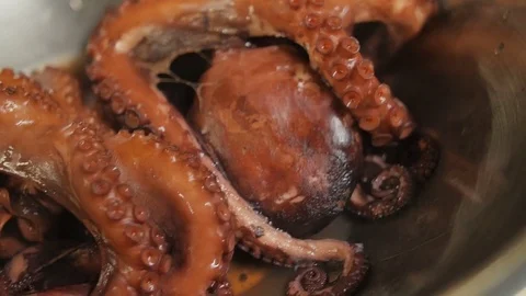 Close up of octopus cooked in a pan Stock-Footage 75414256