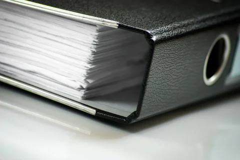 Close-Up of Office Binder Filled with Documents Stock Photos