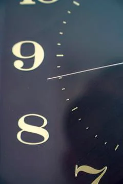 Close up of an office clock Stock Photos