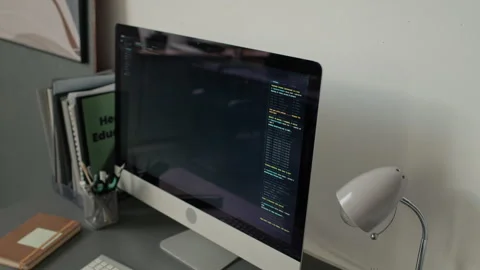 Close up of Office Monitor Displaying code Stock Footage 333204979