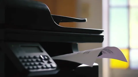 Close Up of Office Printer Printing Document, Buenos Aires, Argentina - 4K Stock Footage 317469353