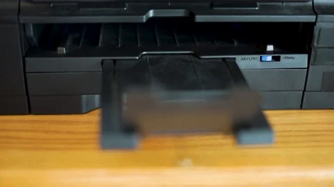 Close up of office printer printing pages - defocused Stock Footage 133998783