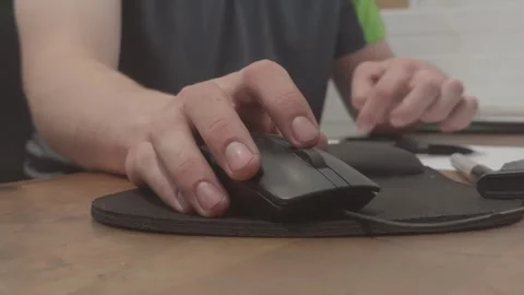 Close-Up of Office Worker Using Computer Mouse at Desk Stock Footage 340454460