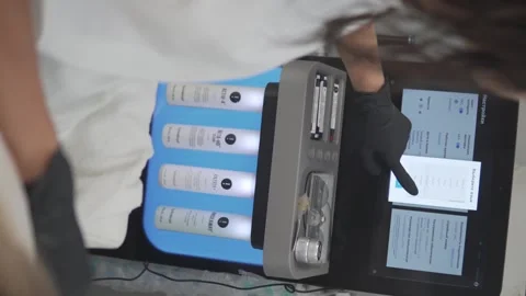 Close-up of the official HydraFacial machine interface with active touch screen Video stock 311874179