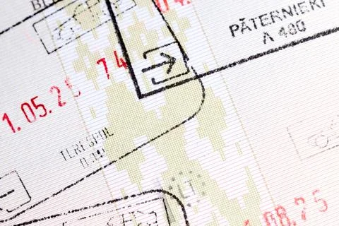 Close-up of official Schengen entry and exit ink stamps border checkpoints .. Stock Photos