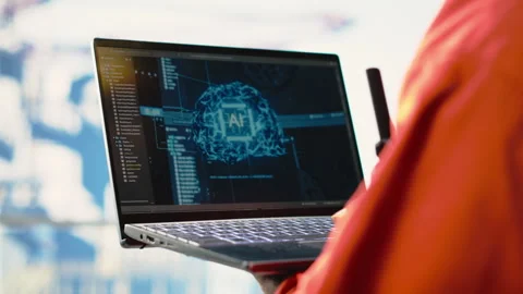 Close up of offshore platform professional using AI tech software on laptop Stock Footage 319972844