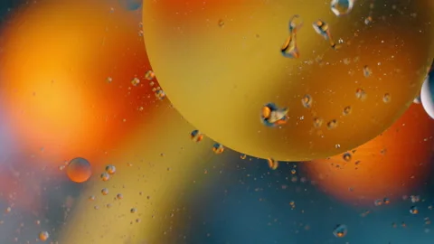 Close-up oil, movement of multicolored bubbles Stock-Footage 136133863