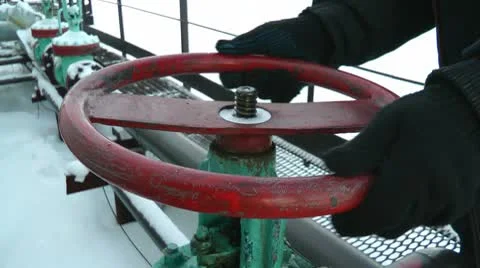 Close oil valve Stock Footage 10712523