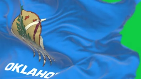 Close-up of Oklahoma state flag waving isolated on green background Video stock 298783873