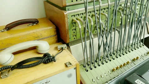 Close-up of an old analog telephone and switchboard used for connecting calls Stock Footage 288014238