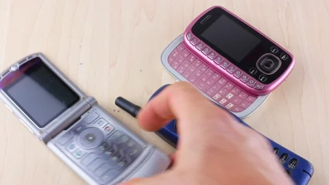 Close up of old and obsolete cellphone, vintage, retro Stock Footage 161434091