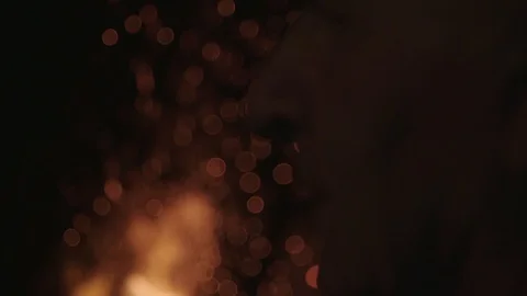 Close up of old blacksmith with fire in background Видео 89328003