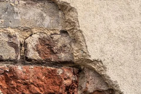 Close up of an old brick wall in Honfleur, France, for an abstract background Stock Photos