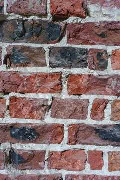 Close up from an old Brick Wall. Stock Photos