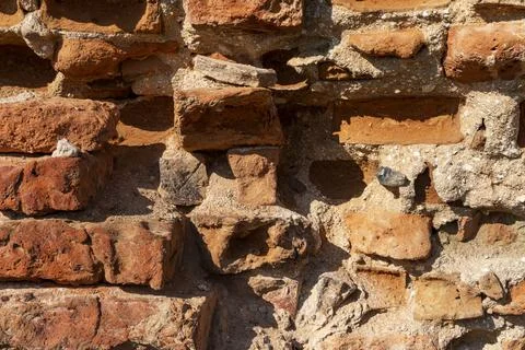 Close-up of old bricks in an ancient brick wall Stock Photos