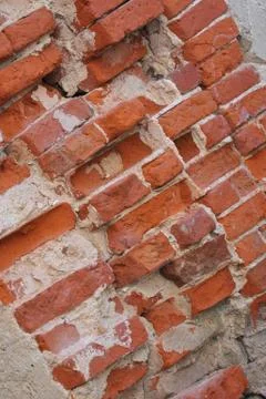Close up on an old bricks wall with copy space for your text. Stock Photos