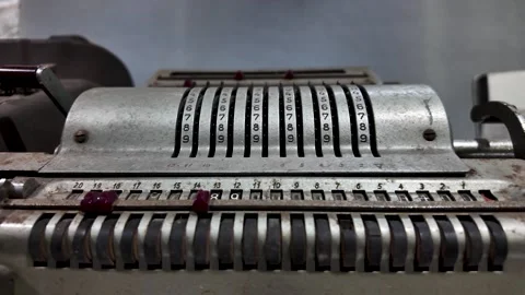 Close up of an old Brunsviga Model 20 mechanical calculator with turning gears Видео 339414103