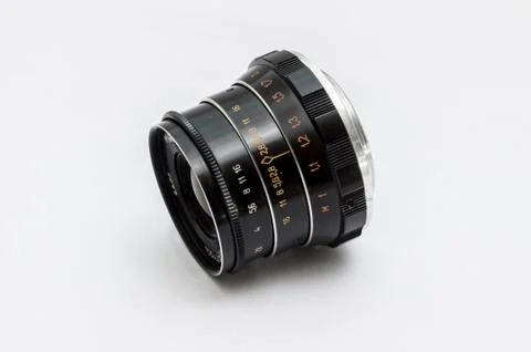 Close up of old camera lens made in ussr on a white background 写真素材