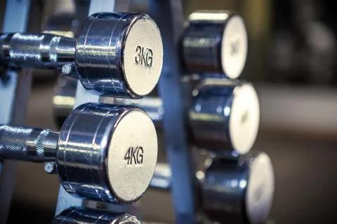 Close up of old chrome dumbbell set. Stock Photos
