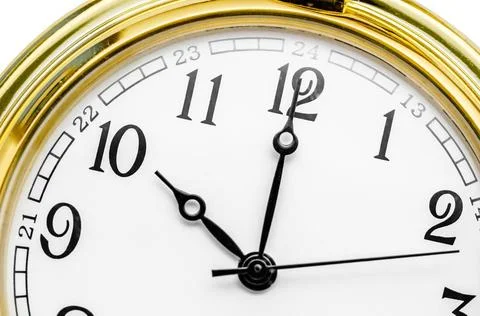 Close up of an Old clock face Close up of an Old gold clock face at 10 AM.... Stock Photos