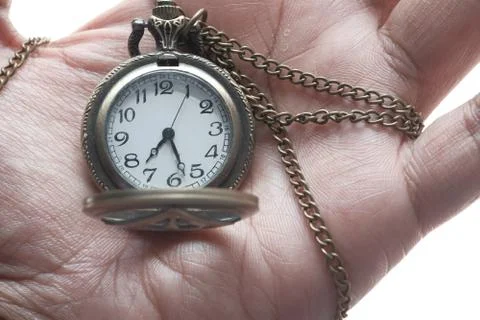 Close up of old clock on hand, deadline concept. Foto stock